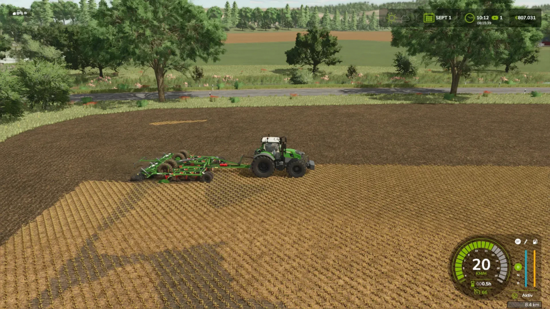 FS25 mod Poettinger Terria 6040 plows a field with a tractor in Farming Simulator 25.