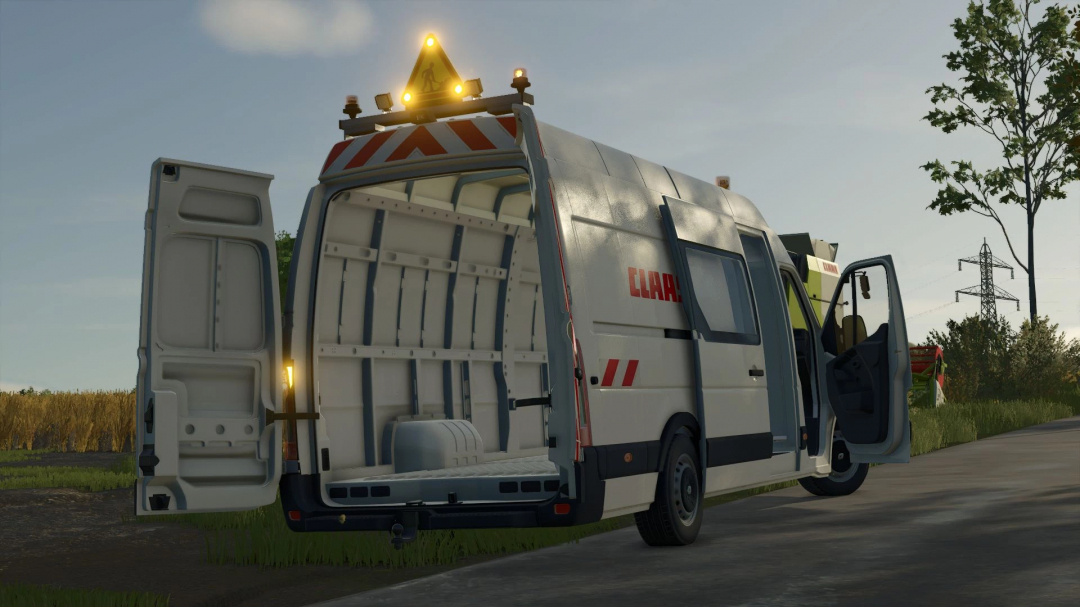 FS25 mod Renault Master L4H3 v1.1.0.3 with open doors and lights on in Farming Simulator 25.