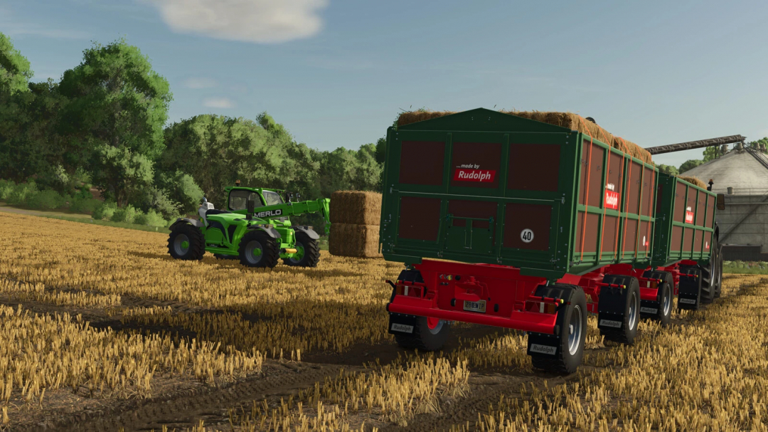 FS25 mod Rudolph/Welger DK 280 RP v1.0.0.0 trailer loaded with hay bales in a field with green tractor.