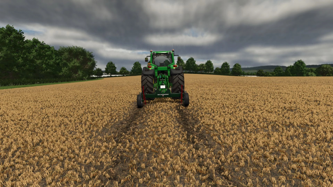 Tractor using Tramline Buster mod in FS25, cultivating a harvested field under cloudy skies.