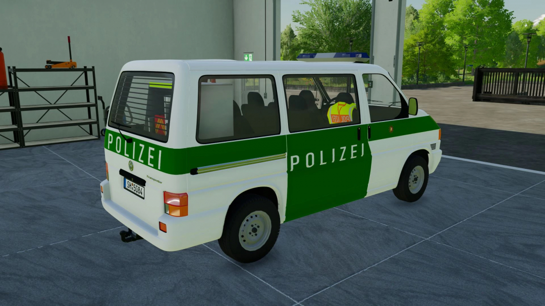 VW T4 Polizei SH Livery mod for FS22 in a garage setting.