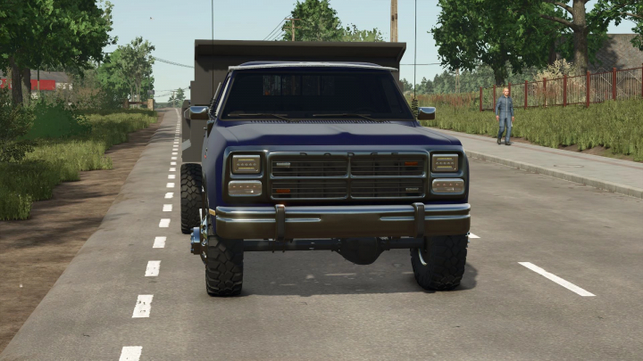 fs25-mods, Front view of a Dodge RAM 3500 Dump Truck mod in Farming Simulator 25, parked on a rural road. FS25 mods enhance gameplay realism.