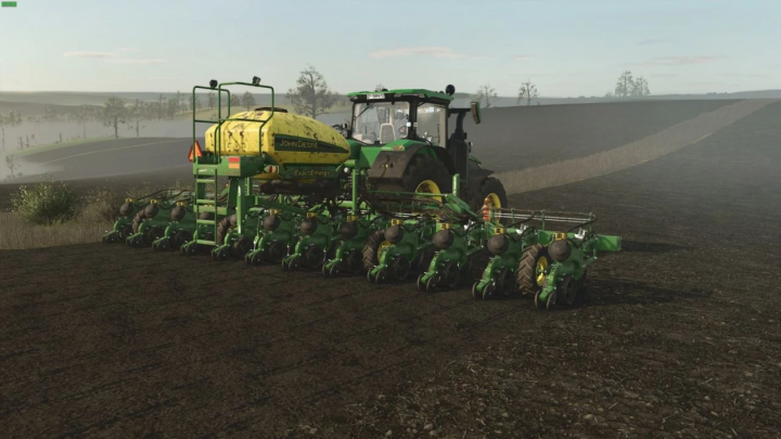 fs25-mods, John Deere 1725C Seeder in FS25 mod, attached to a tractor on farmland.