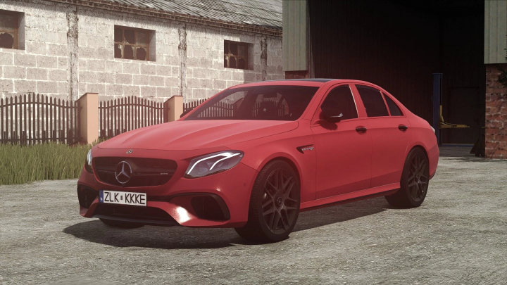 fs25-mods,  Mercedes-Benz E63S AMG 2018 mod in FS25, parked in front of a building, showcasing sleek red design.