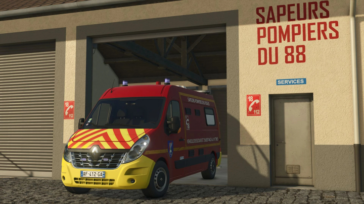 fs25-mods, Renault Master III VSAV mod in FS25, parked at fire station.