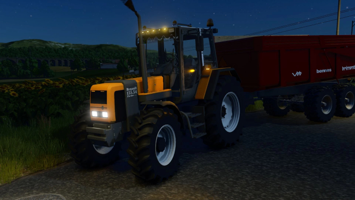 fs25-mods,  Renault TZ tractor mod in FS25 at night with attached trailer.