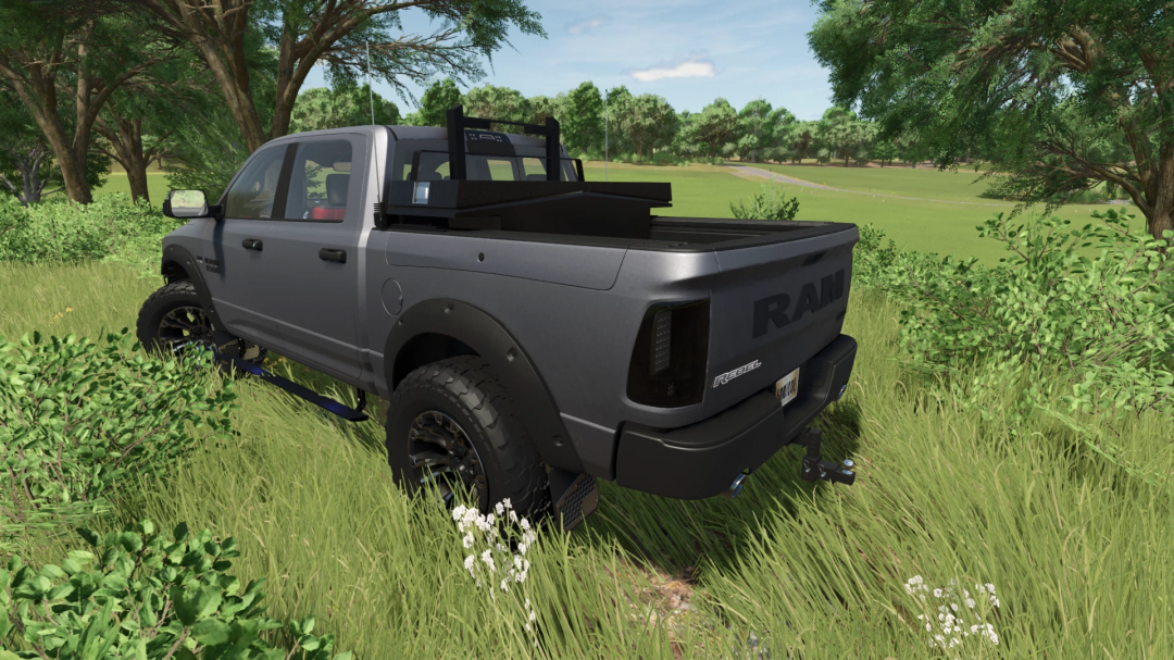 2016 Dodge Ram Rebel 1500 mod in FS25 parked on grassy field.