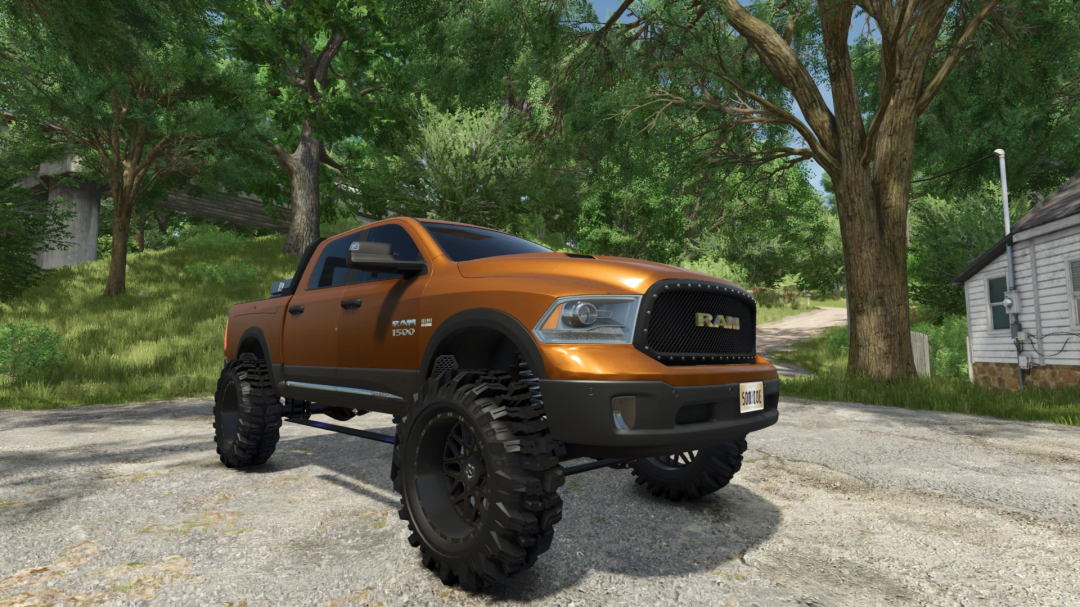 Orange 2016 Dodge Ram Rebel 1500 mod for FS25 in a forest setting.