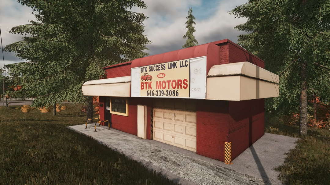 BTK Motors building in FS25 mod, showcasing a red structure with a large sign and surrounding greenery.