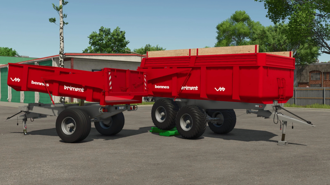 Red Brimont BB trailers in Farming Simulator 25 mod pack, parked on concrete.