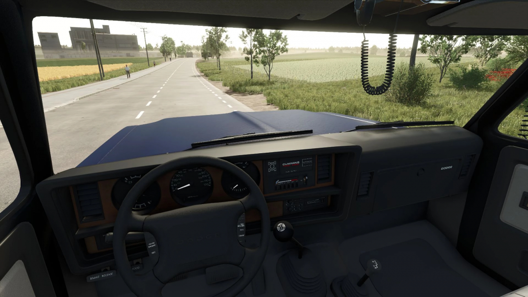 Interior view of Dodge RAM 3500 Dump Truck mod in FS25 showing dashboard and steering wheel.