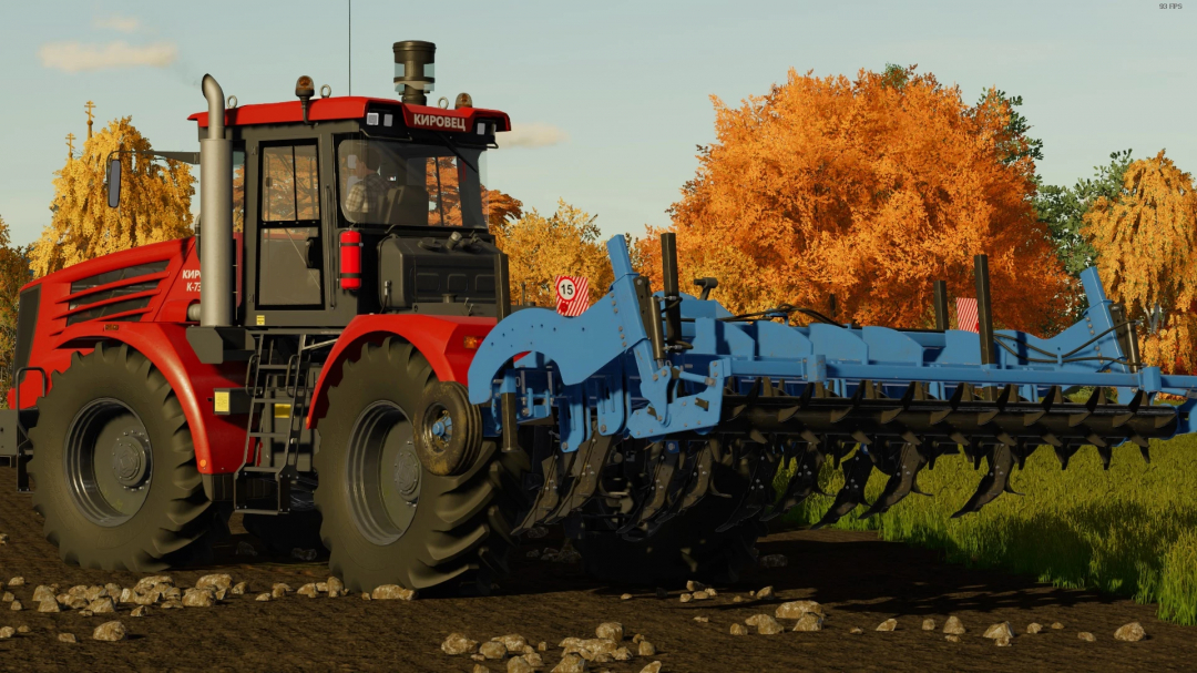 FS22 SHGN-4 mod features a red Kirovets tractor with blue plow on a dirt path in autumn landscape. FS22 mods, Farming Simulator 22 mods.