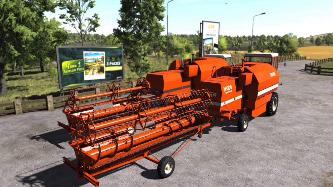 Fahr Pack v1.0.0.0 mod in FS25 showing vibrant red agricultural machinery on a country road.