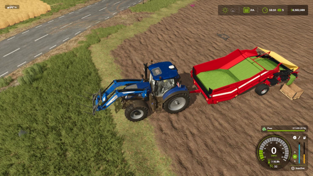 A blue tractor with a Grimme RH2460 mod in Farming Simulator 25, harvesting peas.