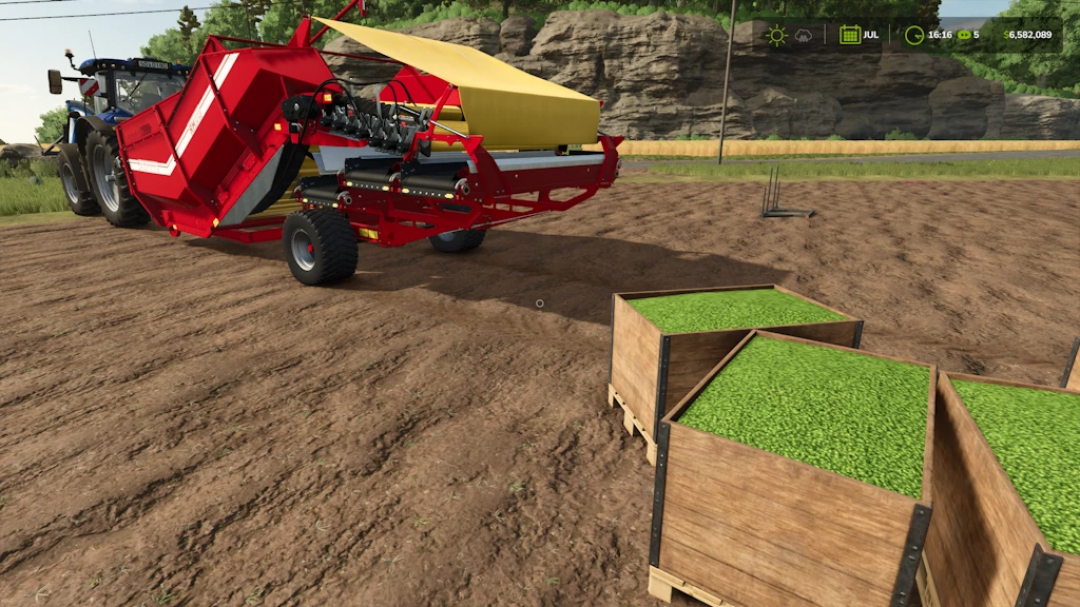 FS25 mod Grimme RH2460 1.0.0.0 harvesting equipment in a field with produce in wooden crates.