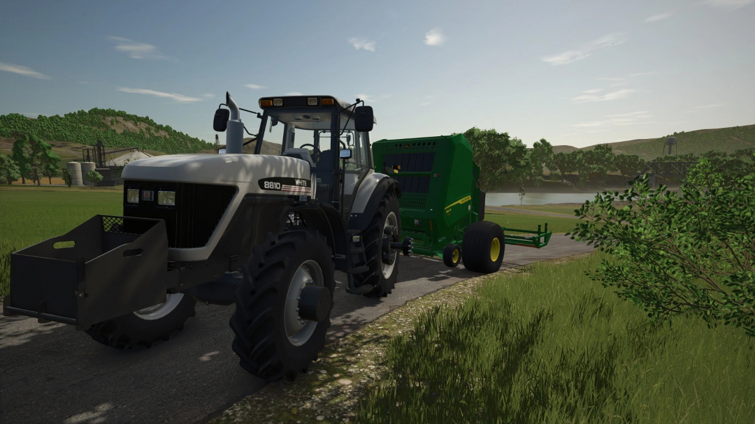 John Deere 561R+A520R Accumulator mod in FS25 showing tractor on rural road.