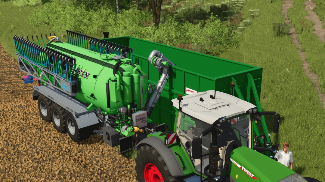 FS25 Joskin Cargo mod showing green farming equipment attached to a tractor in a field.