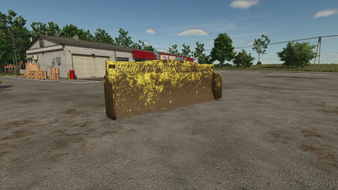 K700 Sliding Shield Own Construction mod in FS25 near a workshop exterior.