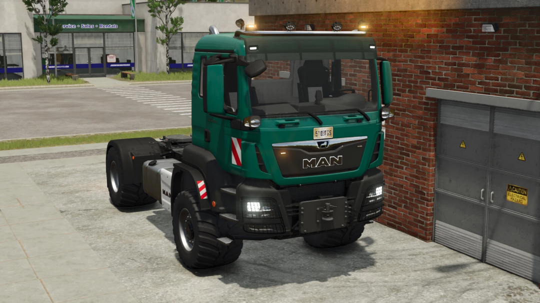 MAN TGS 18 Series mod for FS25 displayed in front of a garage in Farming Simulator 25.