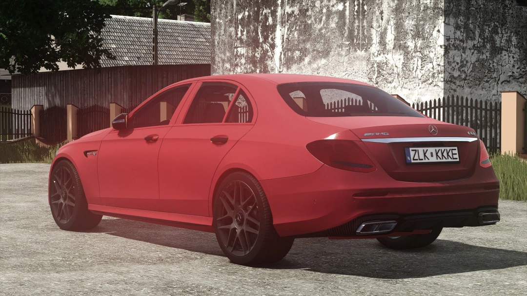 Red Mercedes-Benz E63S AMG 2018 mod for FS25, showcasing rear design in a rural setting.