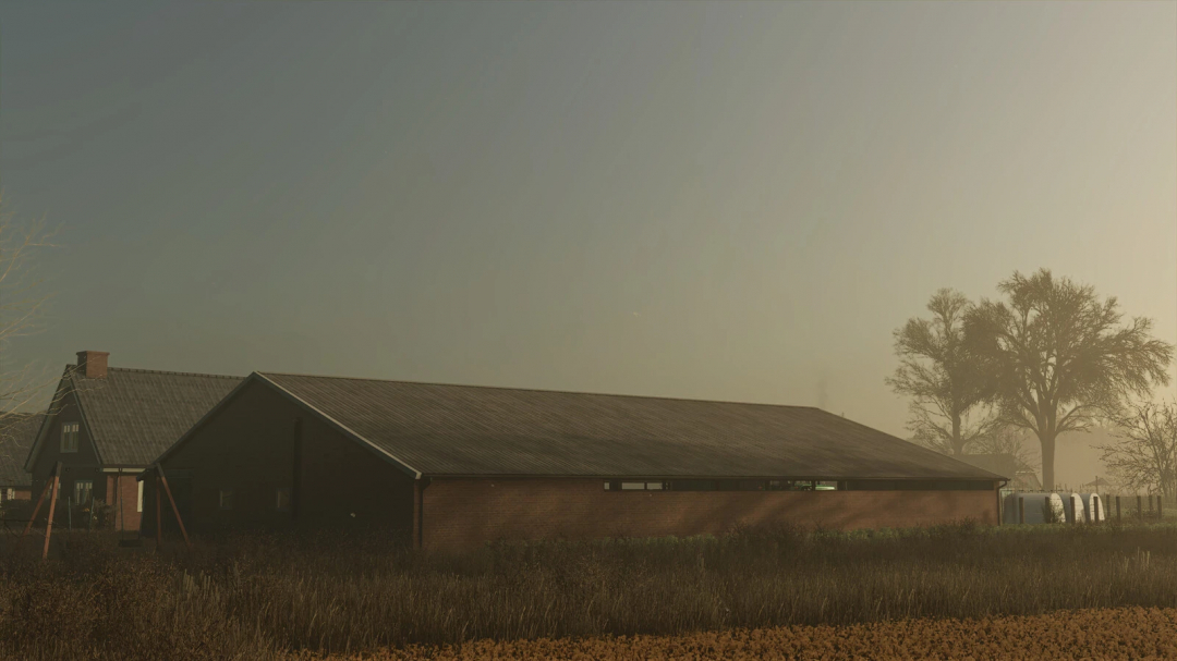 Old cowshed mod in FS25, showcasing a rustic barn with a classic design against a misty backdrop.