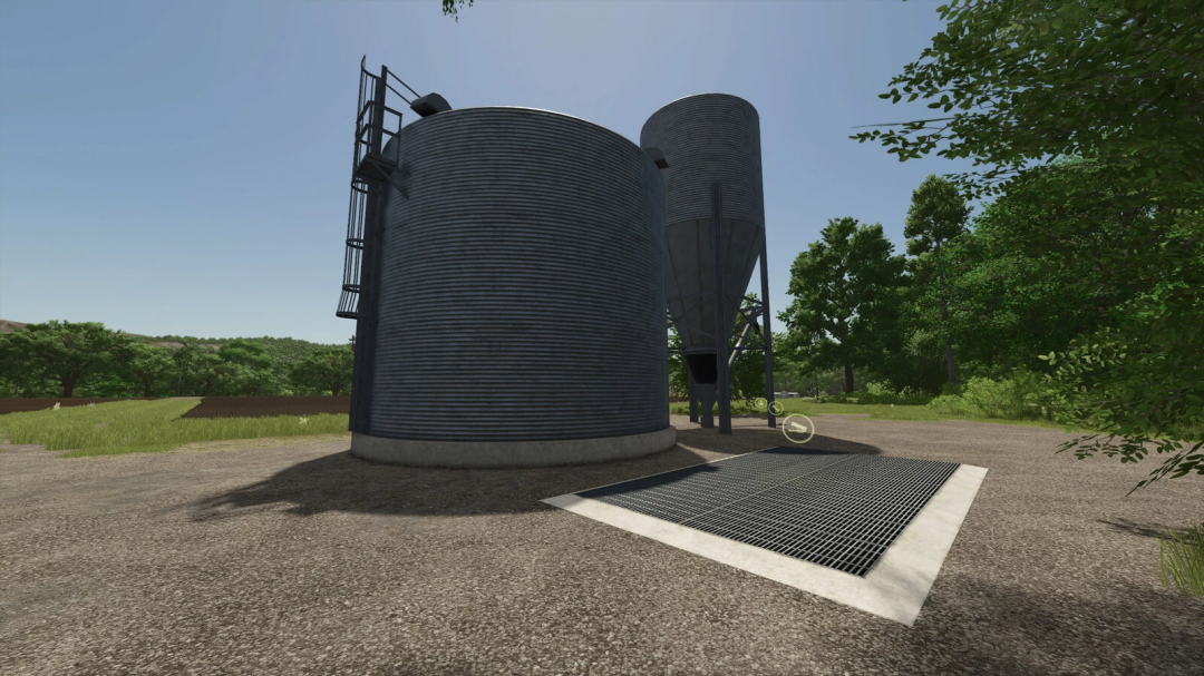 Two large metal silos in a field, part of Productions Pack v1.0.0.0 for FS25 mods, Farming Simulator 25.