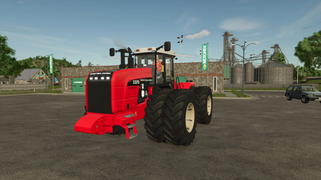 ROSTSELMASH RSM 2375 tractor mod in Farming Simulator 25 showing a red tractor in an industrial area.