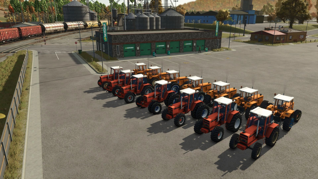 Line of Renault 1181-4 tractors in Farming Simulator 25 mod, parked near a farm with silo and train in background.