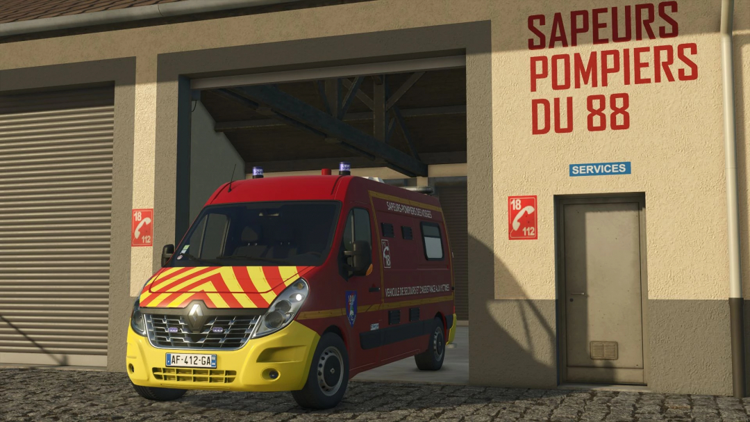 Renault Master III VSAV mod in FS25, parked at fire station.