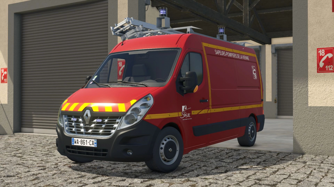 Red Renault Master III fire brigade mod for FS25 parked outside a garage in Farming Simulator 25.