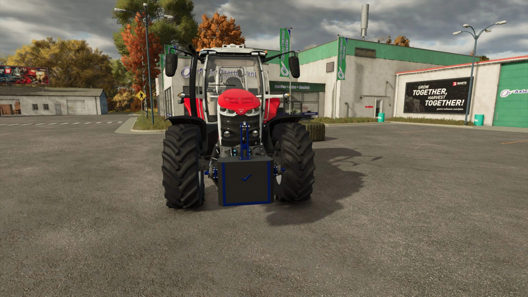 Tractor with Rite 900kg Weight mod in FS25 in front of a farm building.