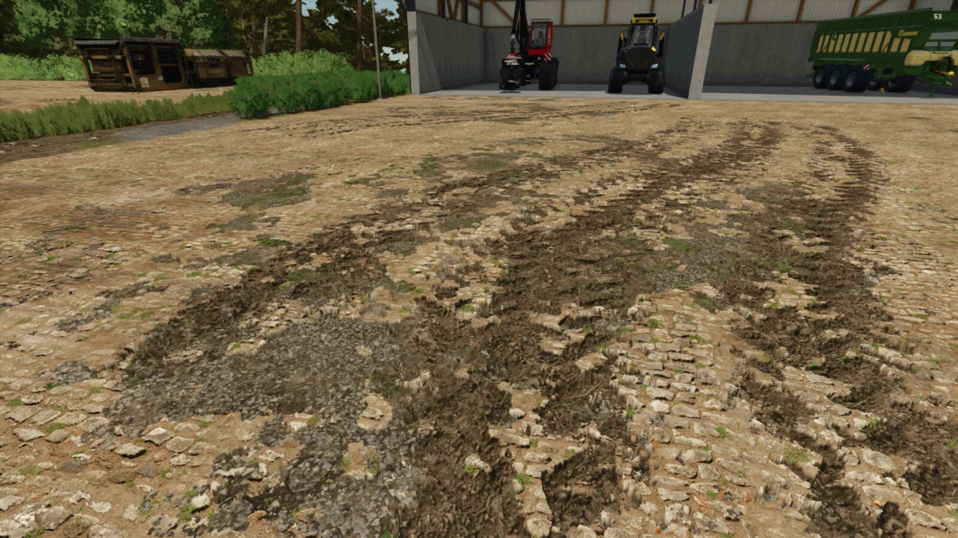 Mud tracks on cobblestone path near equipment in FS25 The Risoux Forest mod.