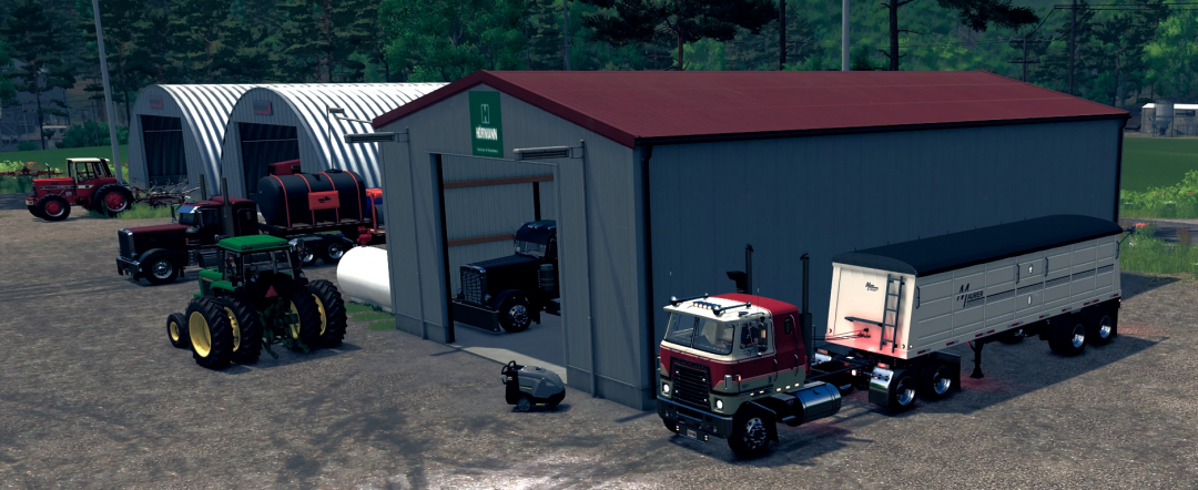 FS25 Transtar Edit mod featuring a truck and trailer parked beside barn, showcasing Farming Simulator 25 vehicles.