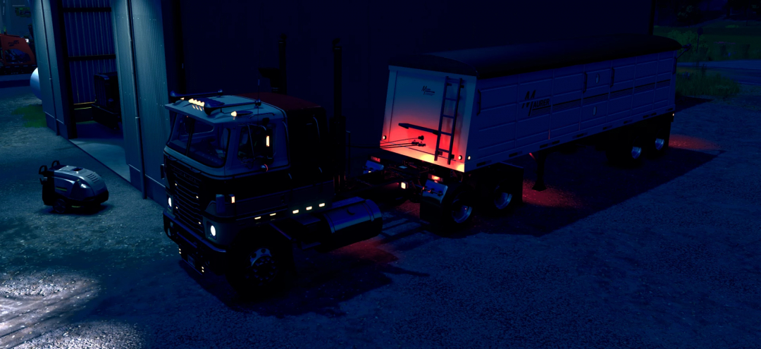 Transtar Edit v1.0.0.0 mod in FS25 showing a truck and trailer at night.