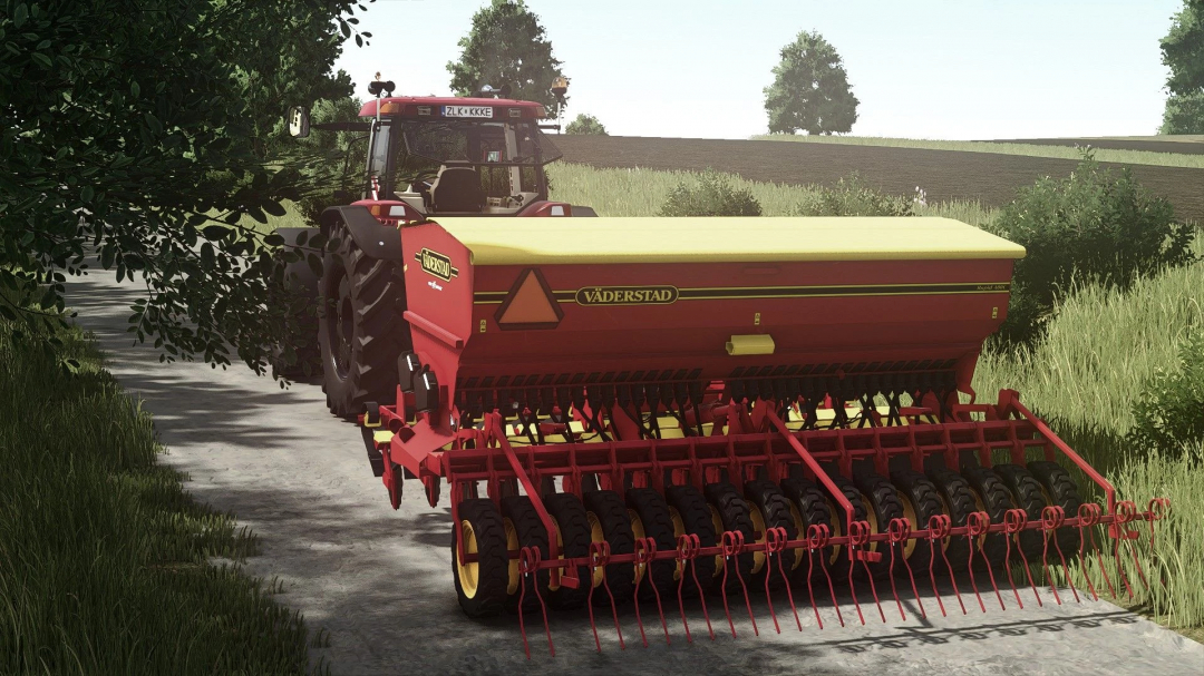 Väderstad Rapid 400C mod in FS25 with a tractor on a rural path.