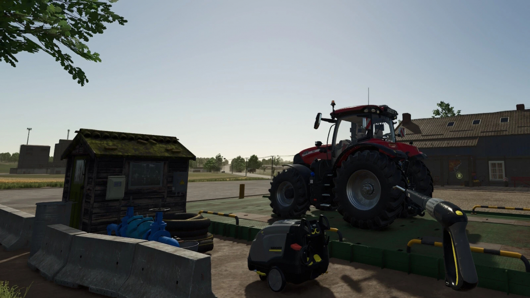 FS25 Washingarea mod v1.0.0.0 showing a tractor at a detailed washing station.