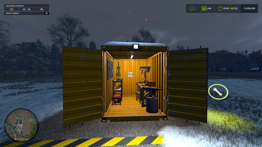 FS25 mod Wheelie Great Workshop shows a lit, detailed interior of a workshop at night in Farming Simulator 25.