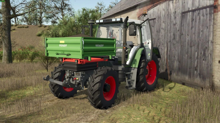 fs25-mods, FS25 mod Fendt 380 GTA tractor with green attachment near a barn.