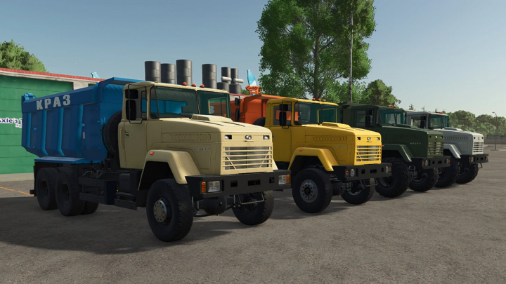 fs25-mods,  Colorful trucks, Kraz 65032 FS25 mod, parked in a row in Farming Simulator 25 environment.