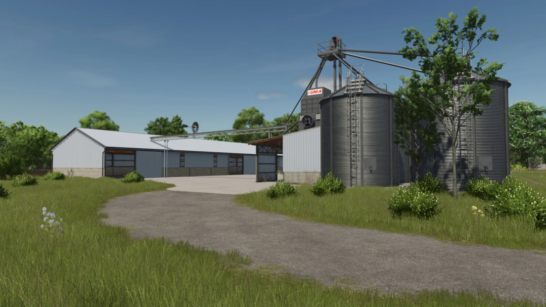 FS25 Grain Complex mod showcasing silos and barns in a rural setting.