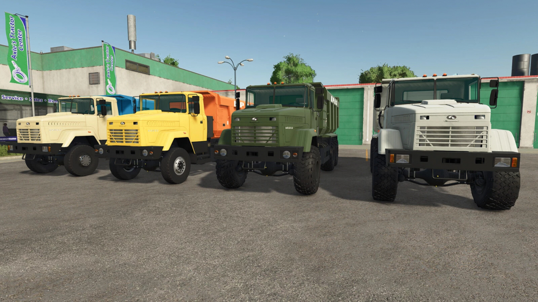 FS25 mod Kraz 65032 v1.0.0.0 with four trucks in different colors at a tractor center.