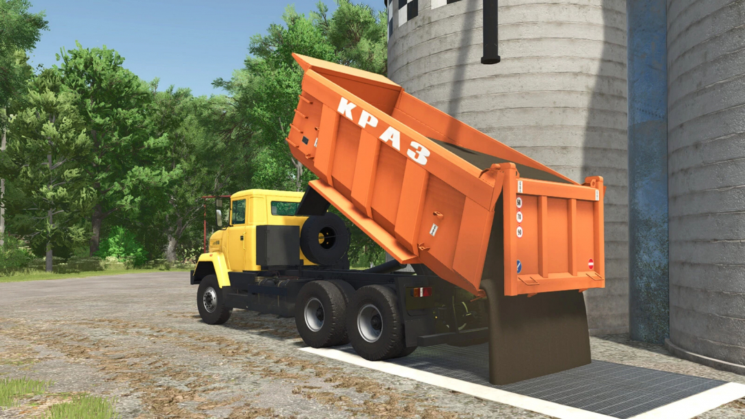 FS25 mod Kraz 65032 truck unloading at a silo in Farming Simulator 25.