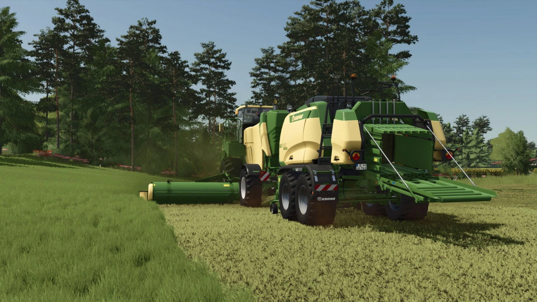 Krone BigM450 mowing grass in forest area in FS25 mod.