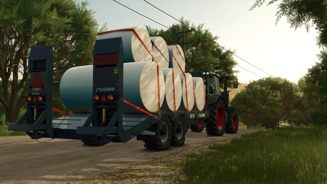 FS25 Lizard ML Low Loader carrying bales on a rural road.