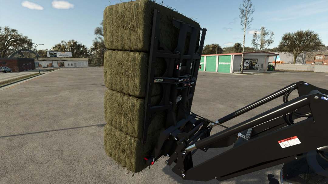 Multi-loader Bale King mod in FS25 carrying hay bales.