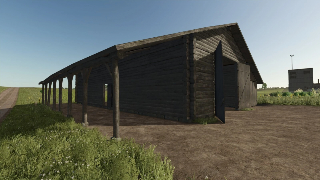 Old log shed in FS25 mod, showcasing a rustic wooden structure on a farm landscape.