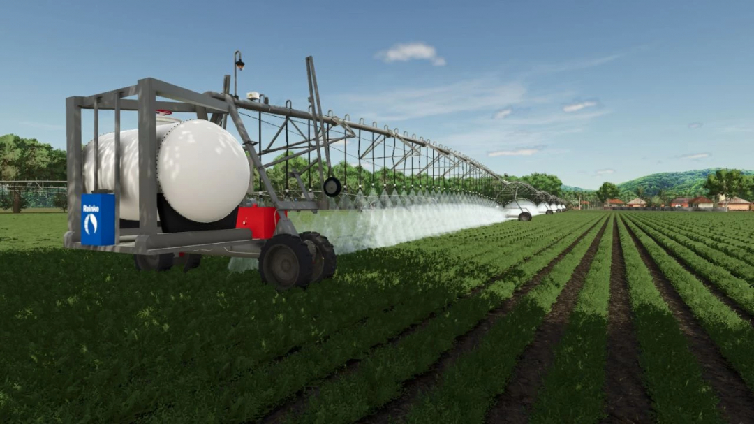 FS25 mod: Reinke Linear Irrigation System v1.0.0.1 spraying water on crops in a field.