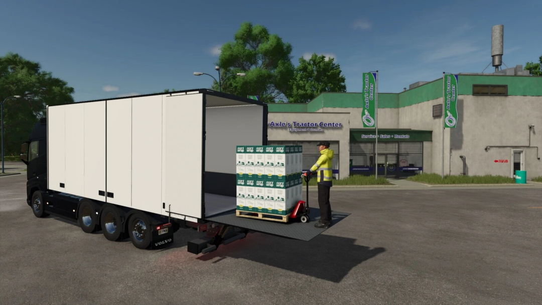 FS25 Taillift Pack mod showing a worker loading boxes onto a truck at a tractor center.