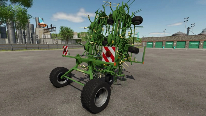 fs25-mods, FS25 Krone KWT 11.22 mod displayed in Farming Simulator 25. Green agricultural machinery parked on a concrete surface.