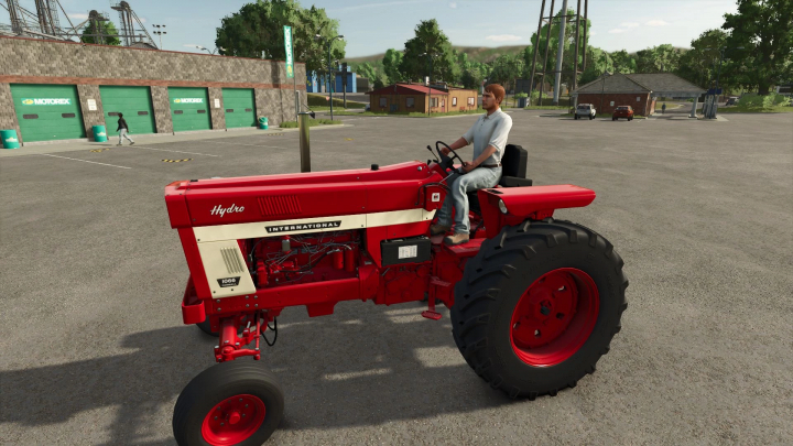 fs25-mods,  FS25 mod Farmall 1066 tractor with red and white design parked in front of garages.